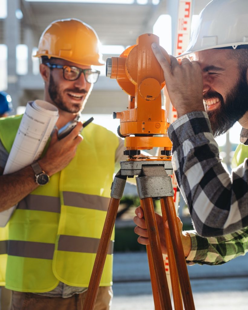 engineer-surveyor-working-with-theodolite-at-construction-site.jpg